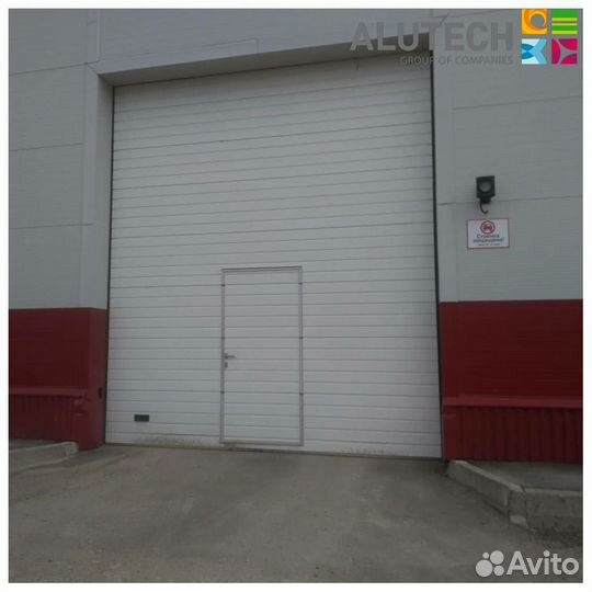 Секционные ворота для гаража alutech