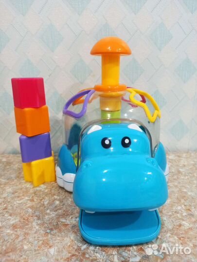 Игрушка бегемот развивающий
