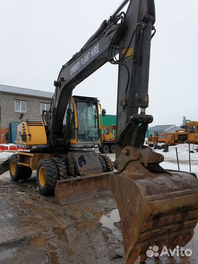 Аренда колесного полноповоротного экскаватора