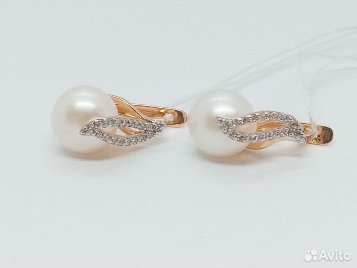 Золотые серьги с камнем