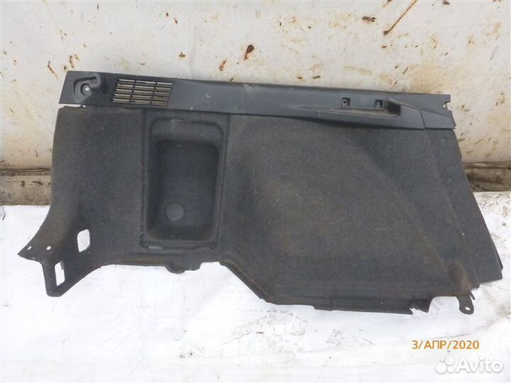 Обшивка багажника задняя левая Mitsubishi Lancer