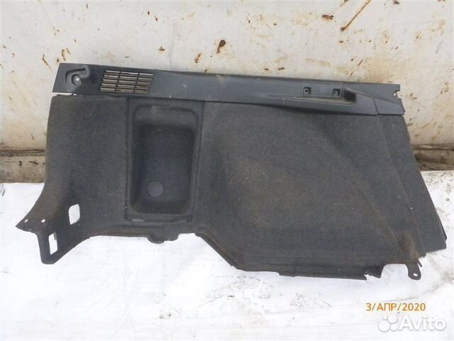 Обшивка багажника задняя левая Mitsubishi Lancer