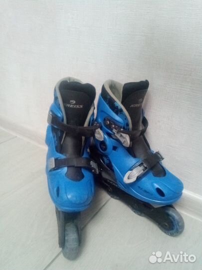 Роликовые коньки