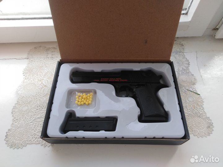 Игрушечный пистолет