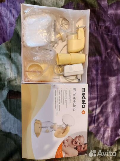 Молокоотсос medela электрический