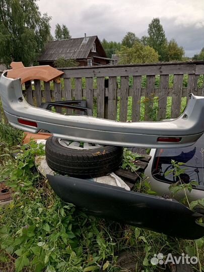 Задний бампер ваз 2111