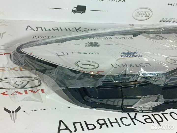 Стекло фары переднее левое Geely Emgrand