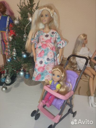 Беременная София и кукла дочь