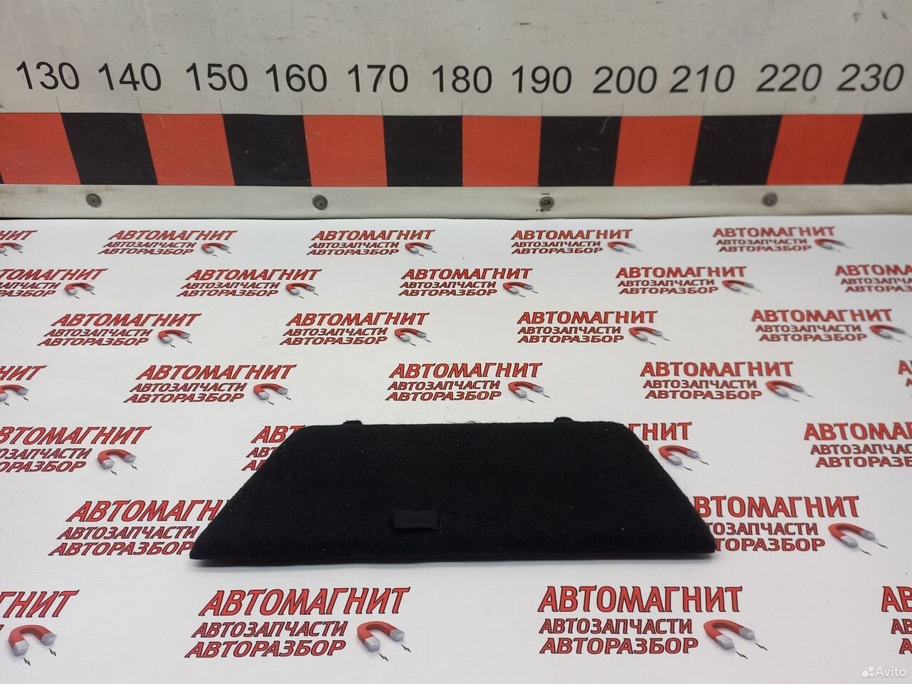 Крышка обшивки багажника левая Джили Тугелла