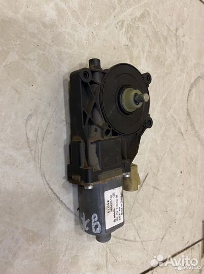 Моторчик стеклоподъемника передний левый Geely Emg