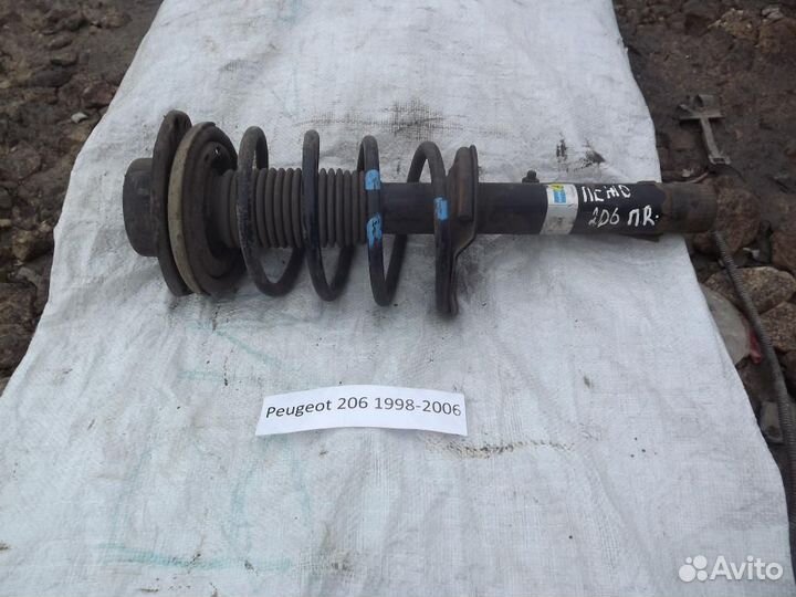 Амортизатор передний правый Пежо 206