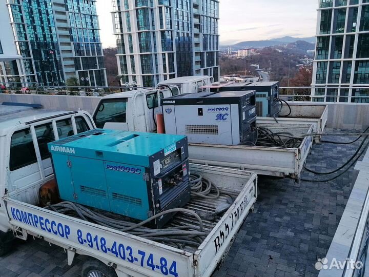 Услуги компрессора с отбойными молотками