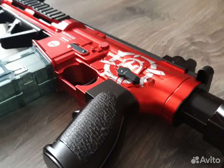 Игрушечный автомат с пульками