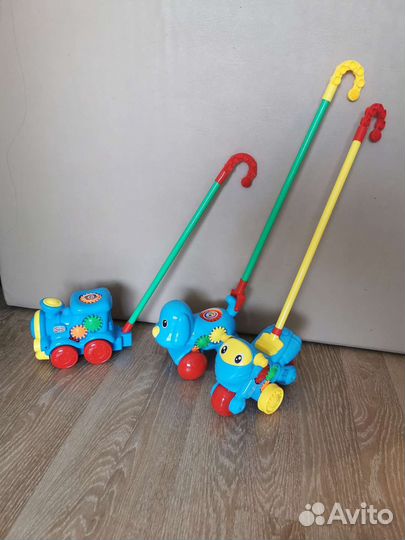 Игрушка на палочке,каталка,паровоз,собачка,мотоцик