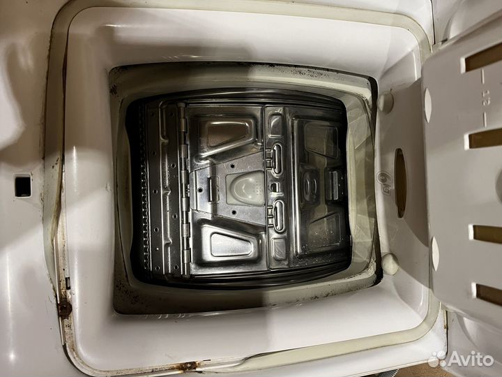 Стиральная машина с вертикальной загрузкой Candy