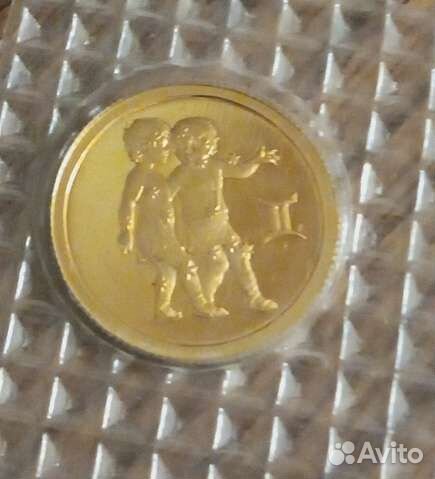 Золотая монета близнецы