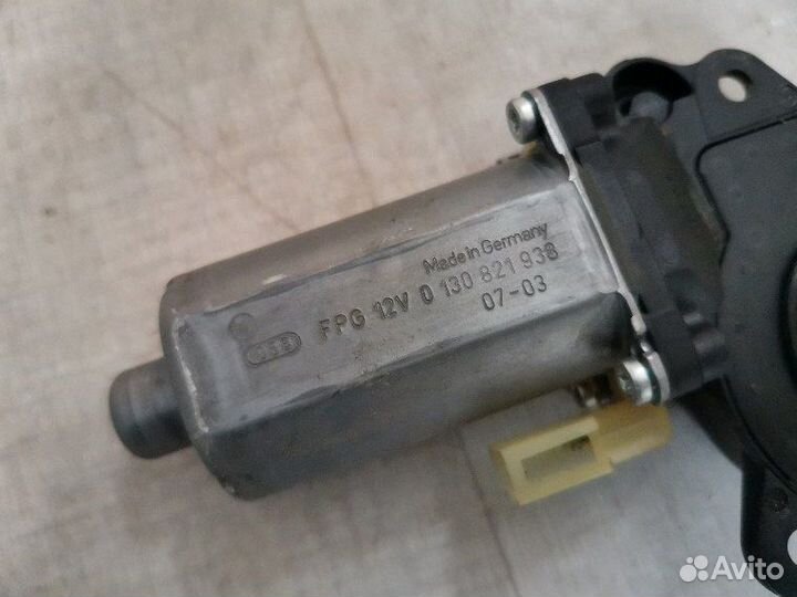 Моторчик стеклоподъемника передний левый Ford
