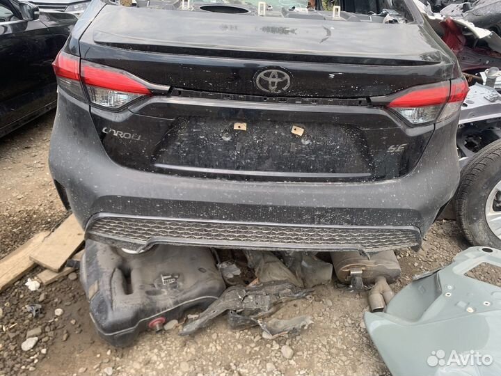 Блок задних фонарей USA Toyota Corolla SE E210