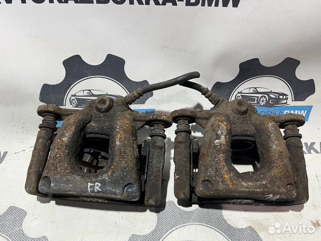 Суппорт тормозной передний левый правый BMW 1-сери