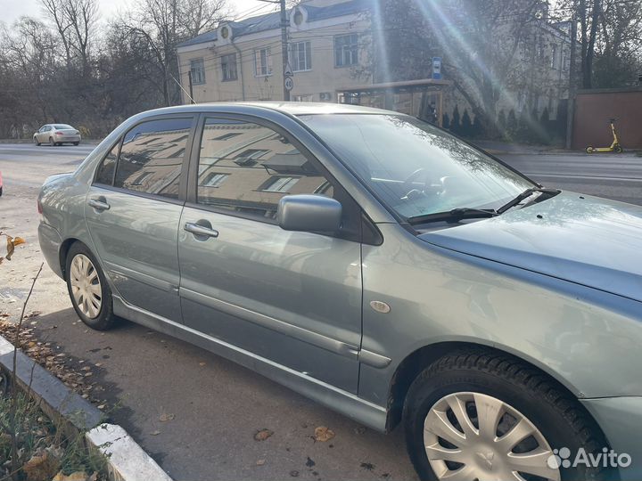 Mitsubishi Lancer 1.6 МТ, 2006, 230 000 км