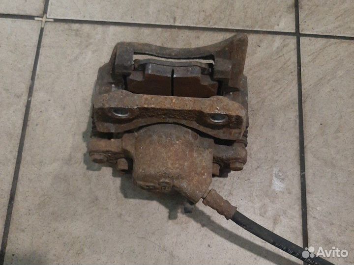 Лада Ларгус тормозной суппорт передний левый