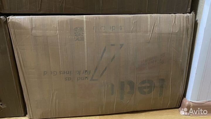 Коробка с детской одеждой