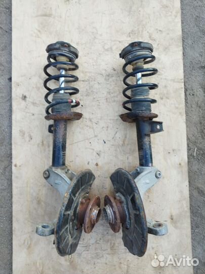 Передние стойки Volkswagen Passat B6