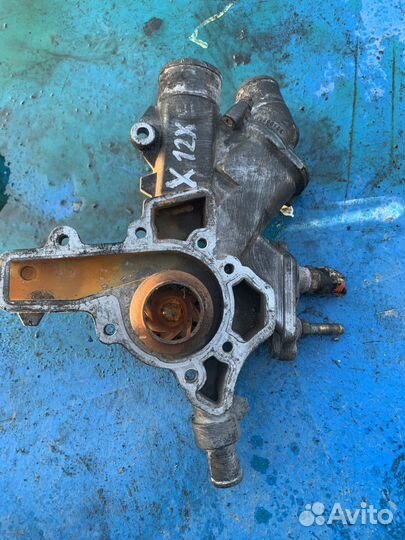 Opel corsa помпа водяной насос x12xe