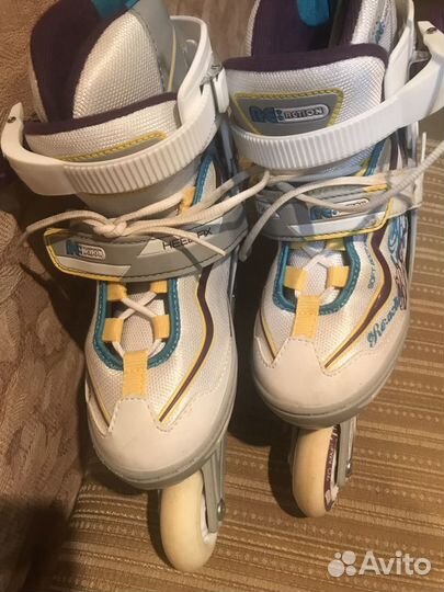 Роликовые коньки