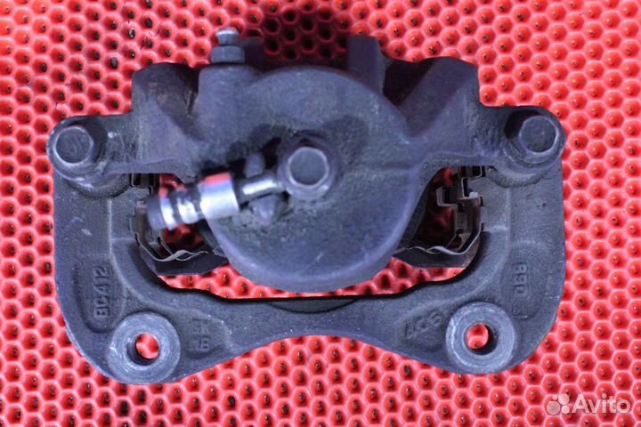 Суппорт тормозной передний левый Hyundai Tucson JM