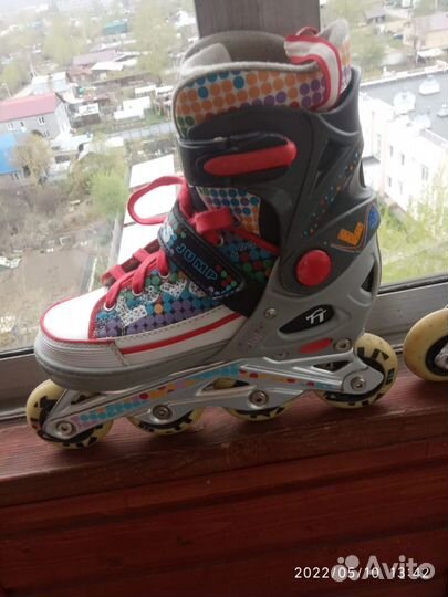 Роликовые коньки