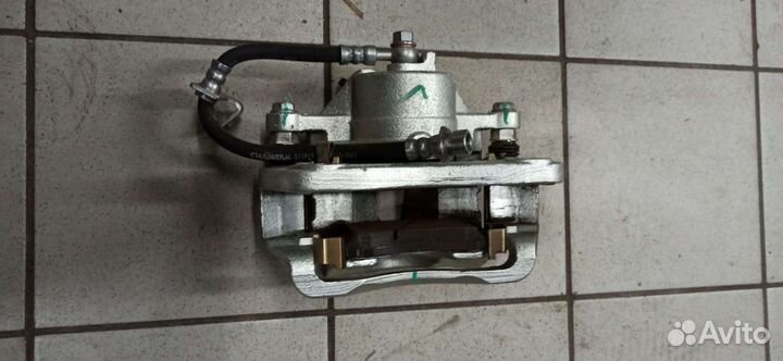 Суппорт тормозной передний Changan CS35 Plus