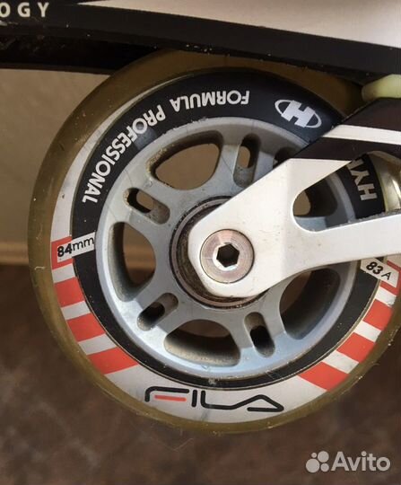 Роликовые коньки