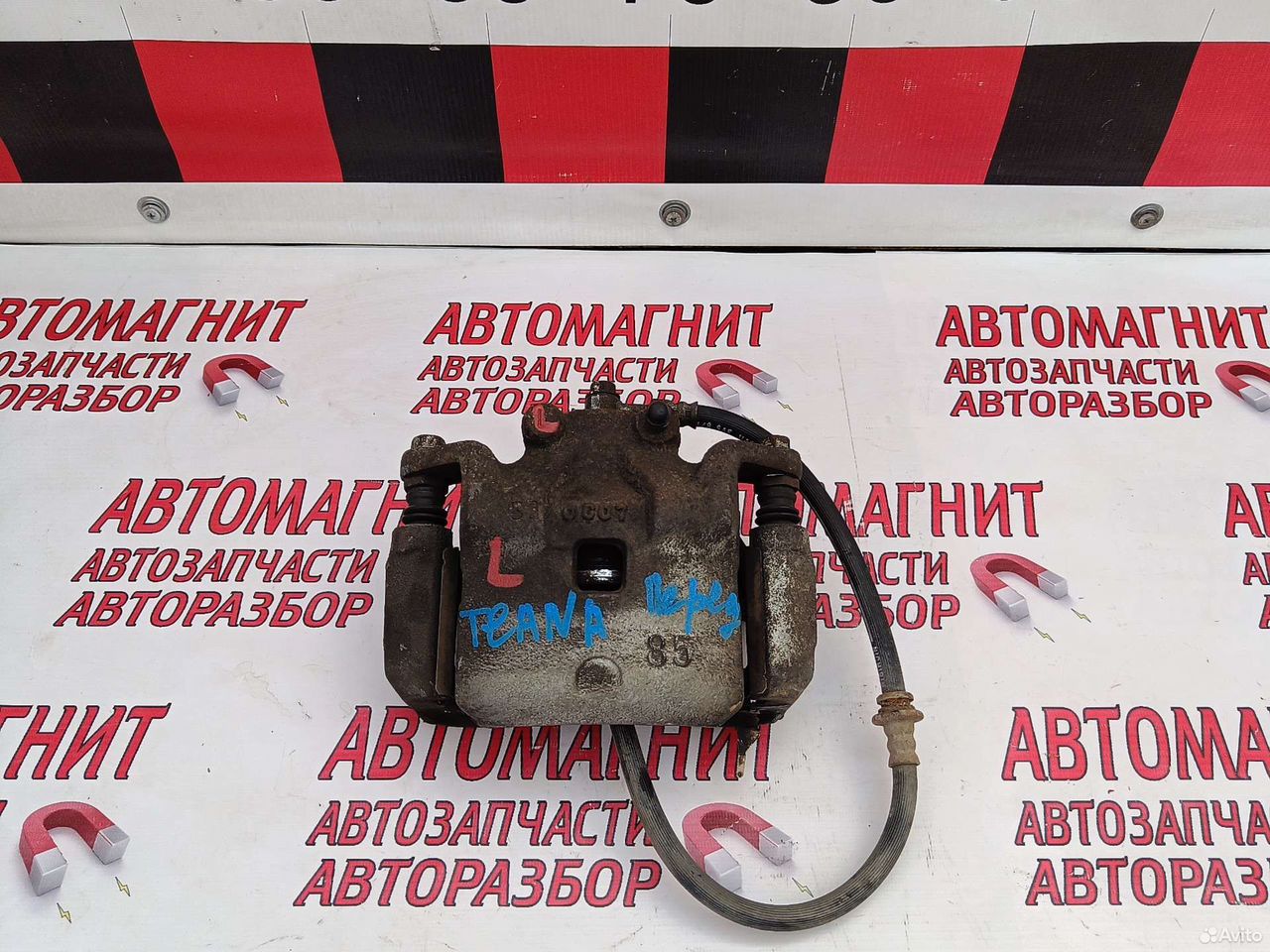 Супорт тормозной передний левый Ниссан Теана j32