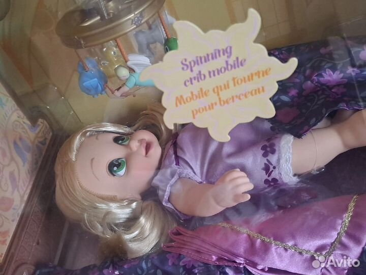 Малышка Рапунцель в колыбельке