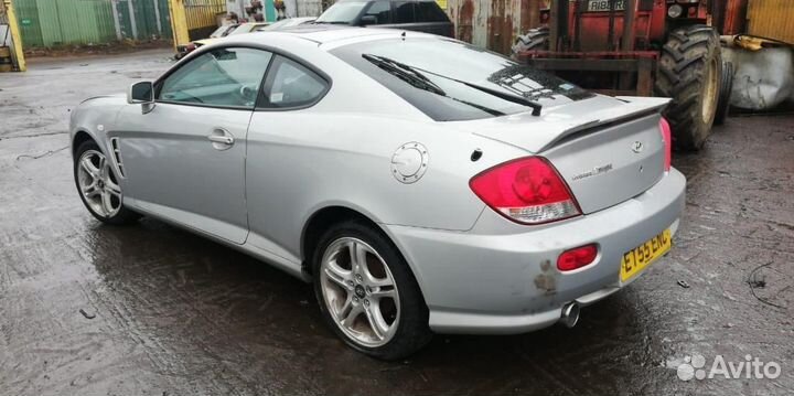 Спойлер крышки багажника Hyundai Coupe 87220-20000