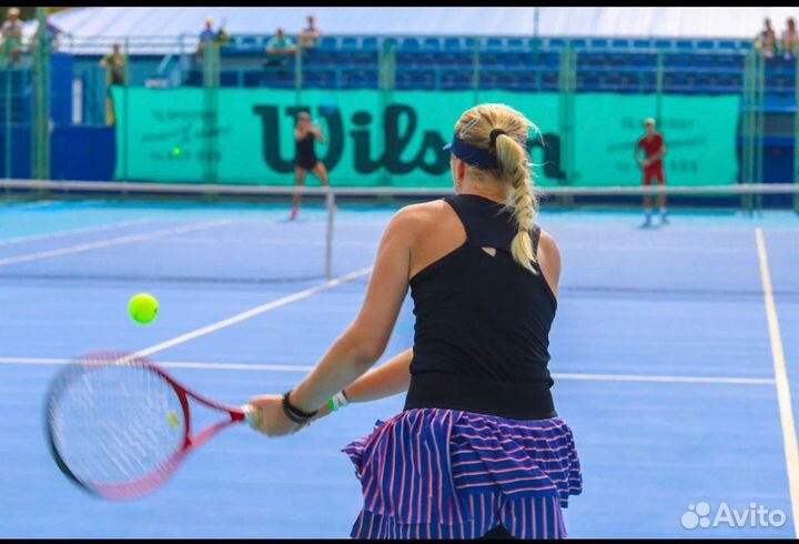 Тренер по большому теннису