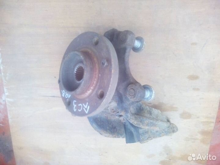 Кулак поворотный левый Ситроен С3 2002-2009