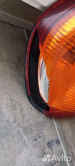 Фонарь задний левый рено симбол