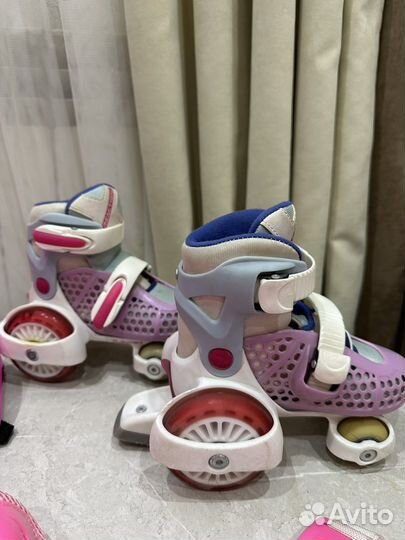 Роликовые коньки