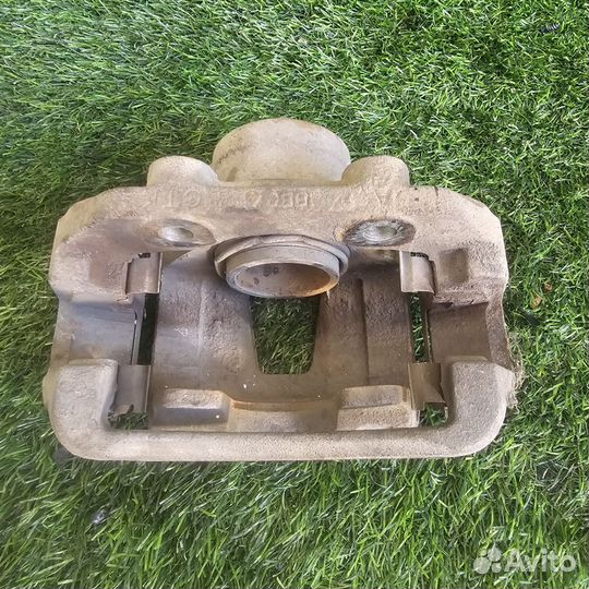 Суппорт передний левый Daewoo Nexia N100