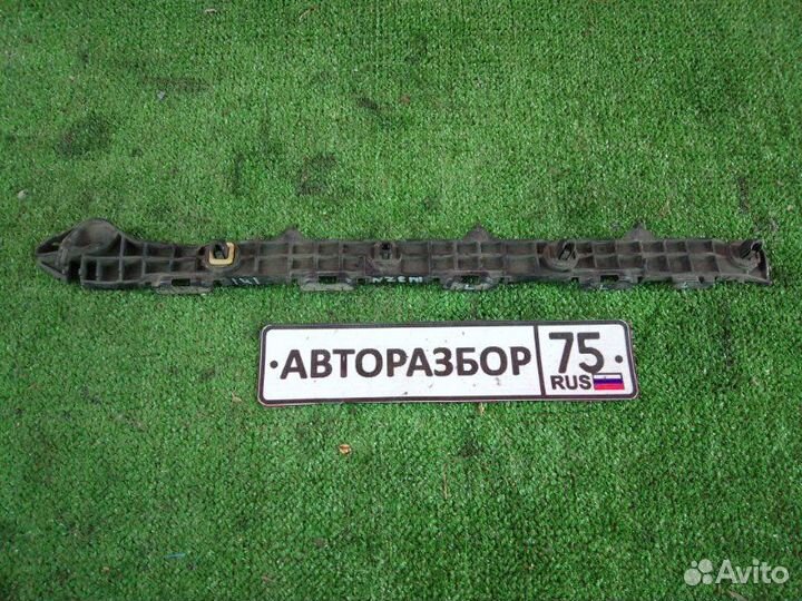 Крепление бампера заднее левое Toyota Corolla Axio