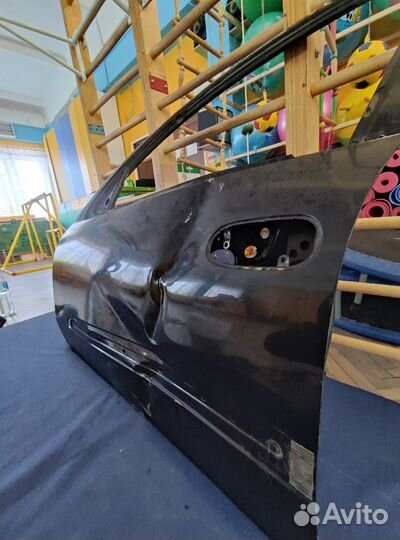 Продам переднюю левую дверь Nissam Almera Classic