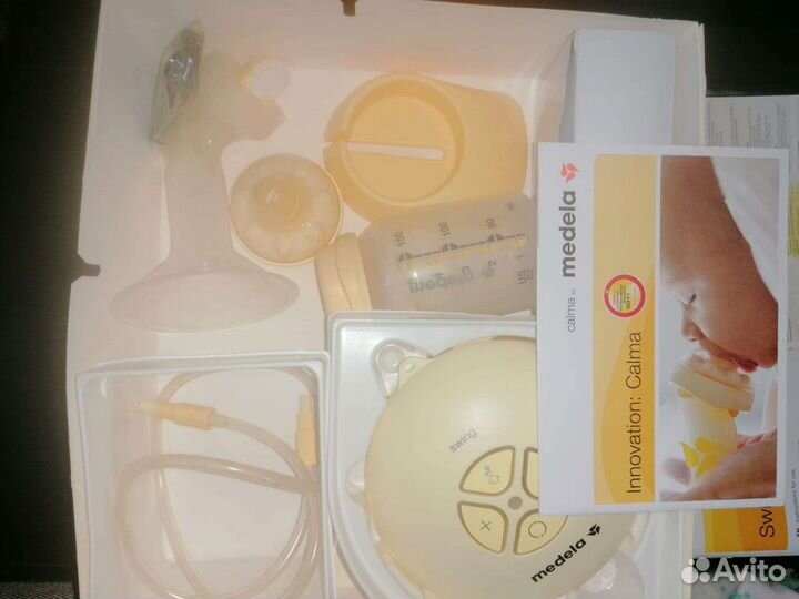 Молокоотсос medela электрический