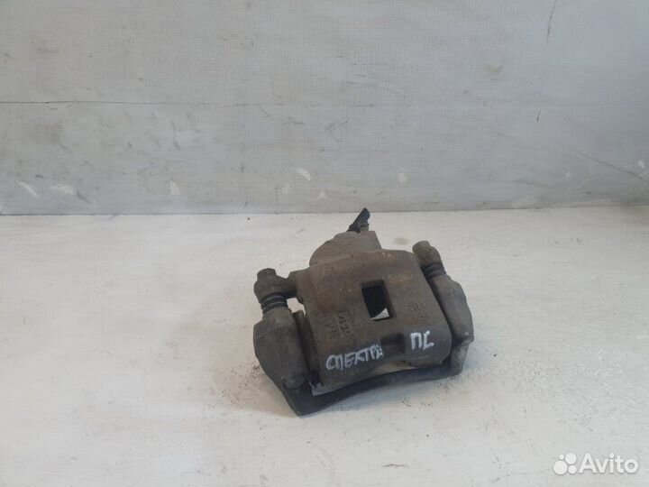 Суппорт передний левый Kia Spectra седан S6D 2007