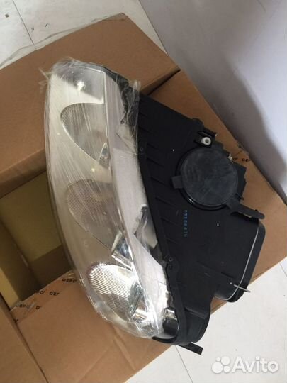 Левая Фара VW touareg 03-07 с электро корректором