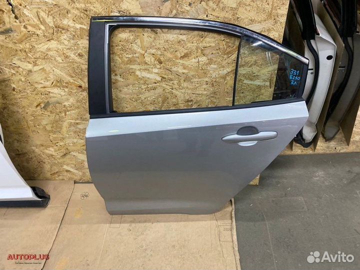 Тойота Королла Е210 левая дверь