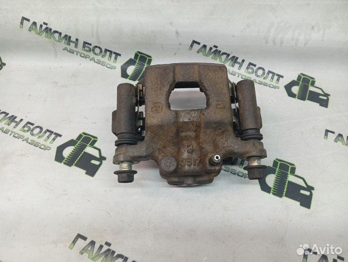 Суппорт тормозной задний правый Nissan Qashqai J10