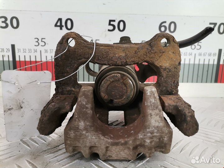 Суппорт задний левый Volkswagen Passat B5 2001