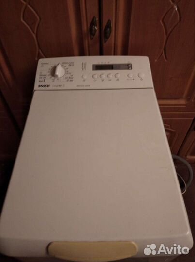 Стиральная машина с вертикальной загрузкой